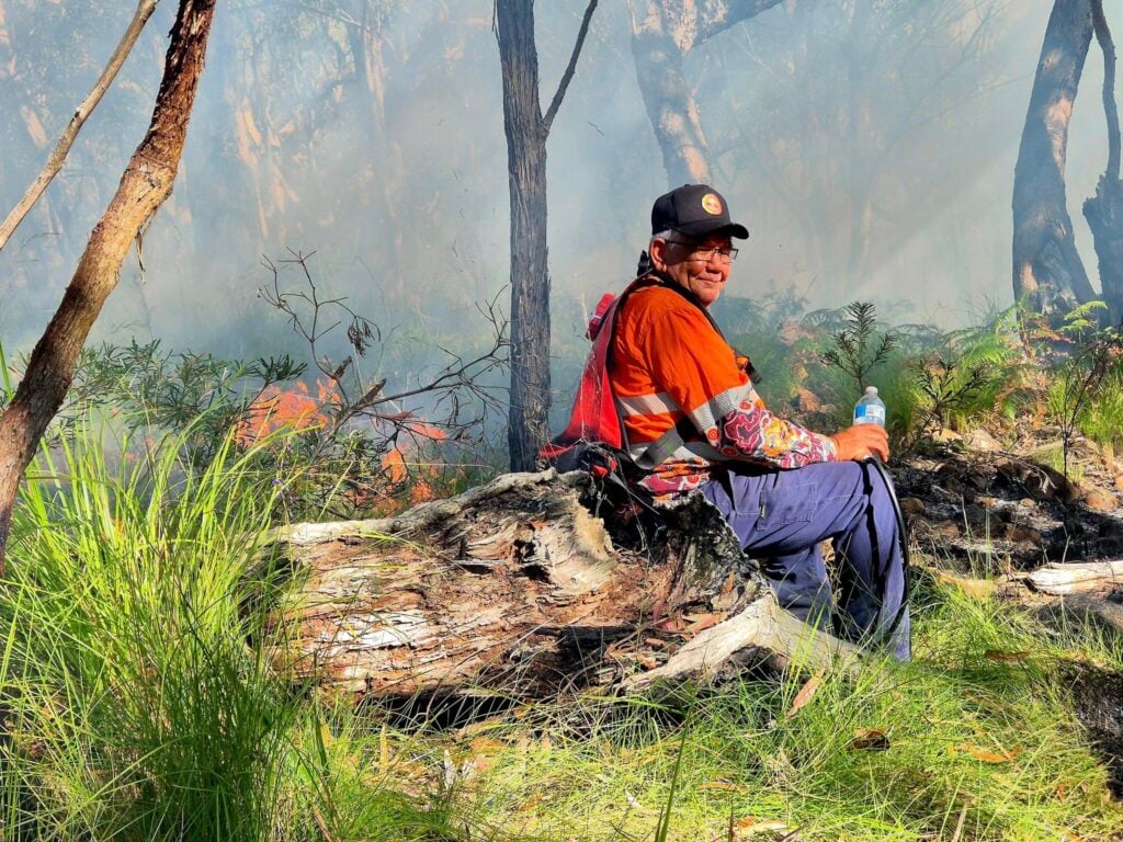 firefighter taking a break during a controlled burn bindelong